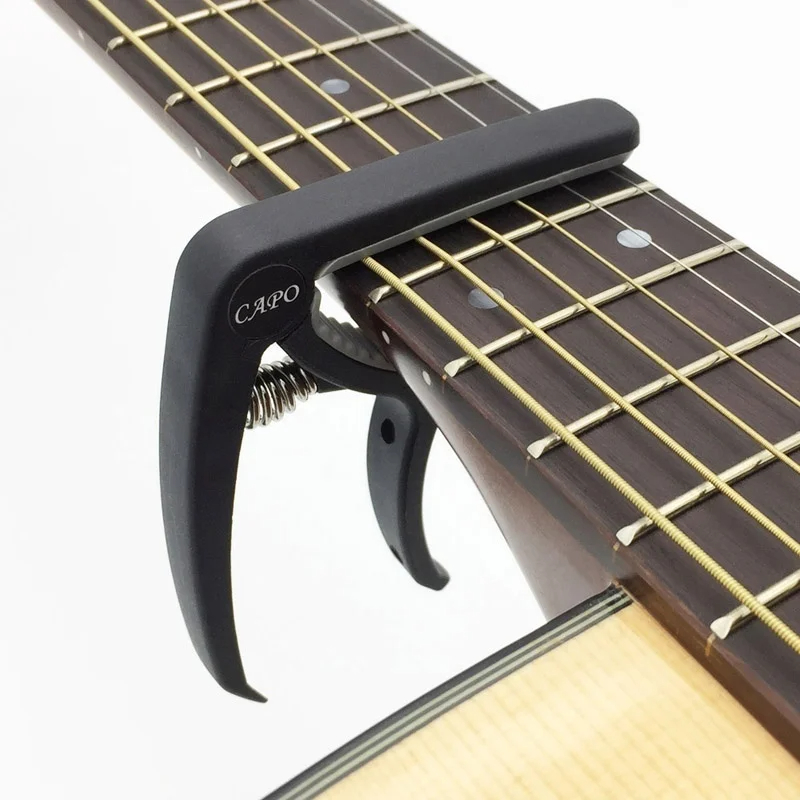 Plastik Gitar Capo 6 Dize Akus - Musical Instrument Names incelemesi ve fiyatı