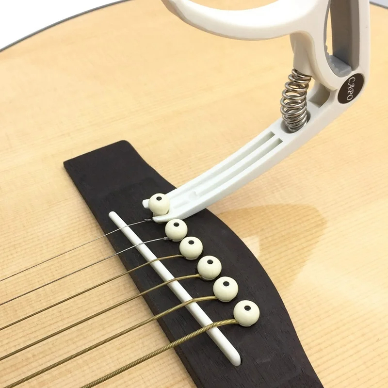 Plastik Gitar Capo 6 Dize Akus - Musical Instrument Names incelemesi ve fiyatı