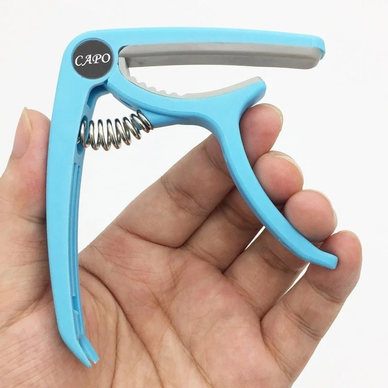 Plastik Gitar Capo 6 Dize Akus - Musical Instrument Names incelemesi ve fiyatı